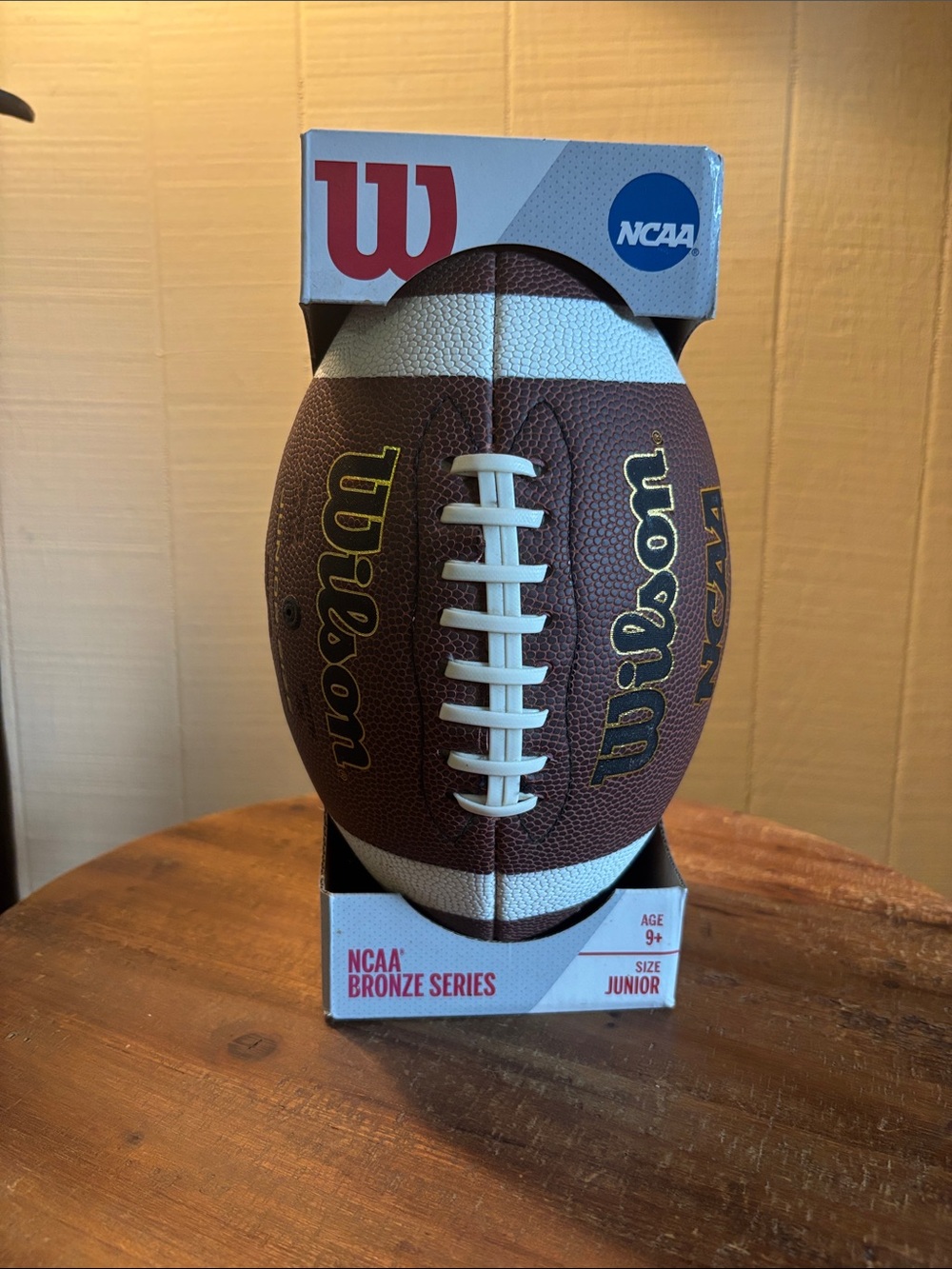Wilson Junior Football in Brown and White with Gold Logo